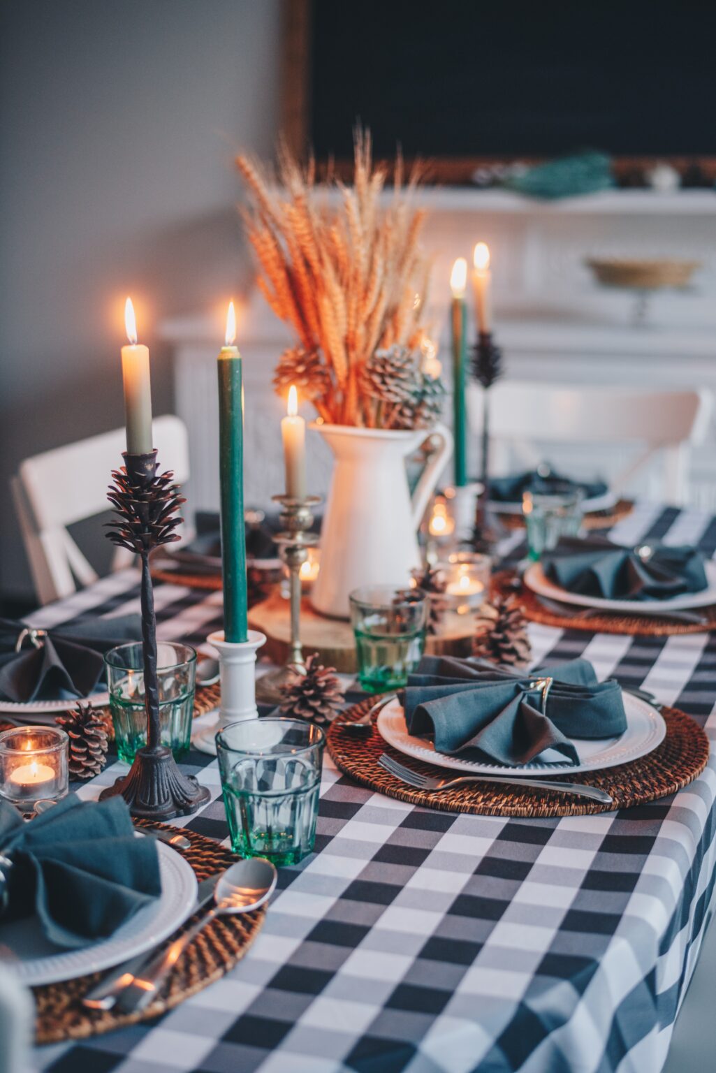 table setting with table cloth candles and dishes