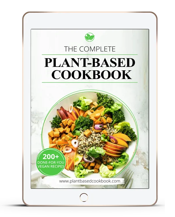 the complete Plant based cookbook with vegetables in bowl